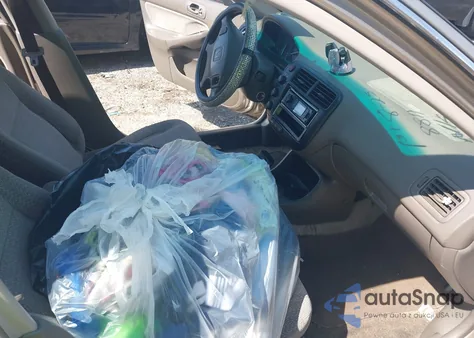 2000 Honda Civic Lx from USA, damaged, VIN 1HGEJ6678YL007090